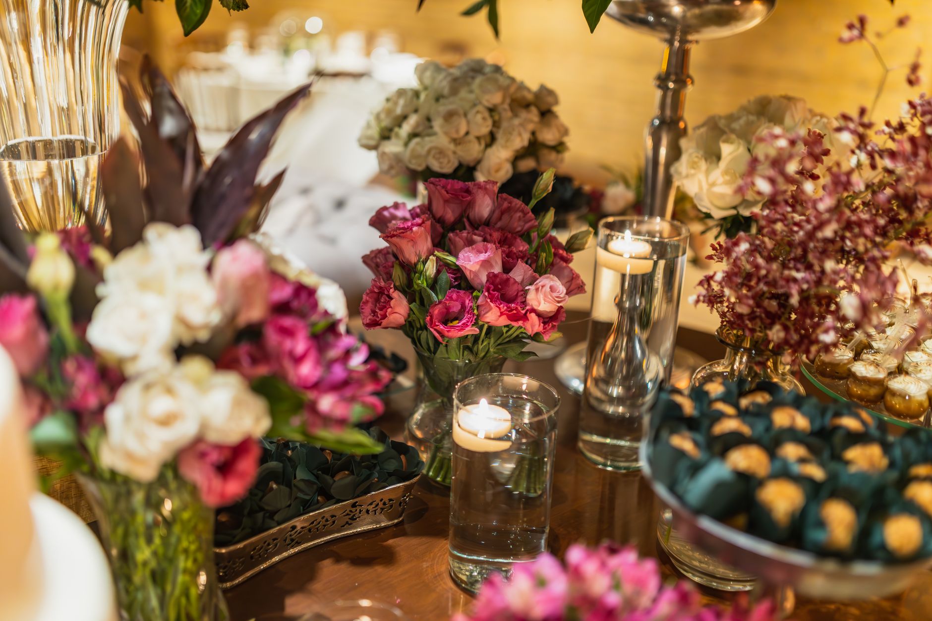 A table set with flowers and candlelight